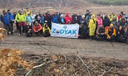 Zodyak Ekibi, Yangınzedelere Saygıyla Fidanları Toprakla Buluşturdu